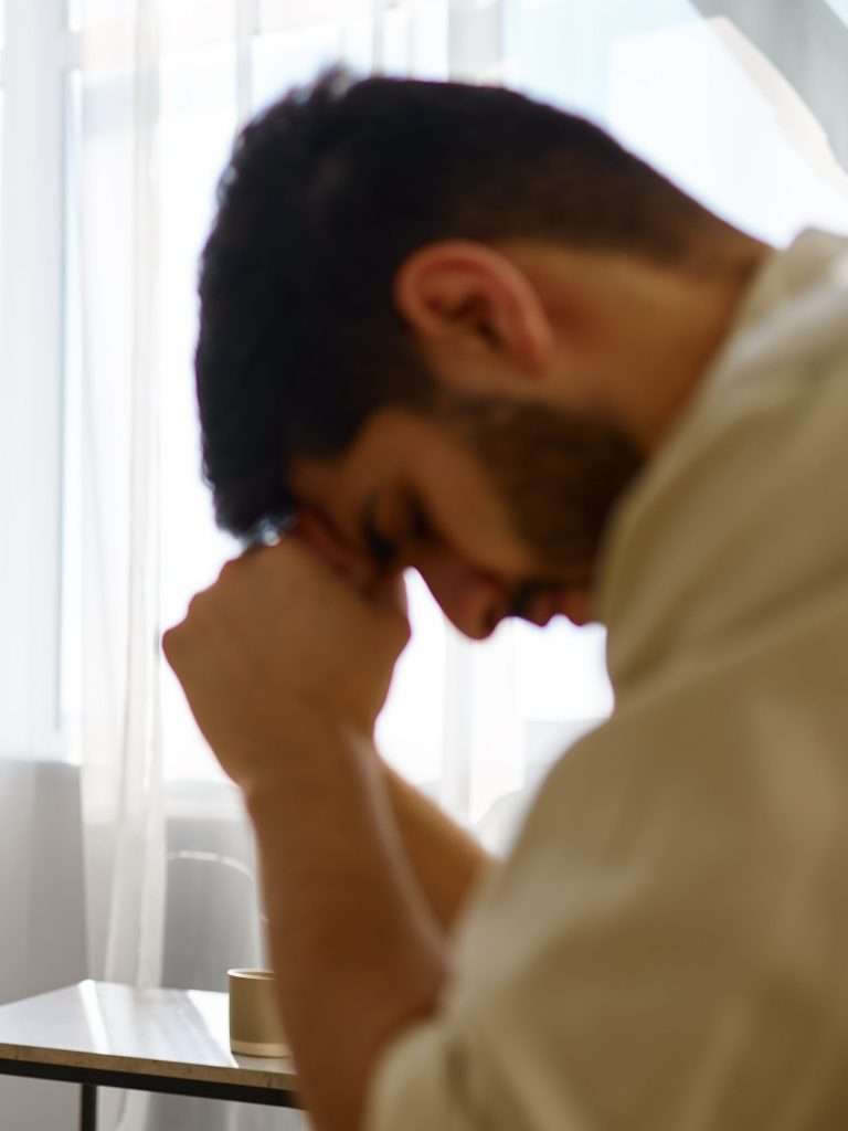 Psychologist talking to depressed frustrated unhappy man