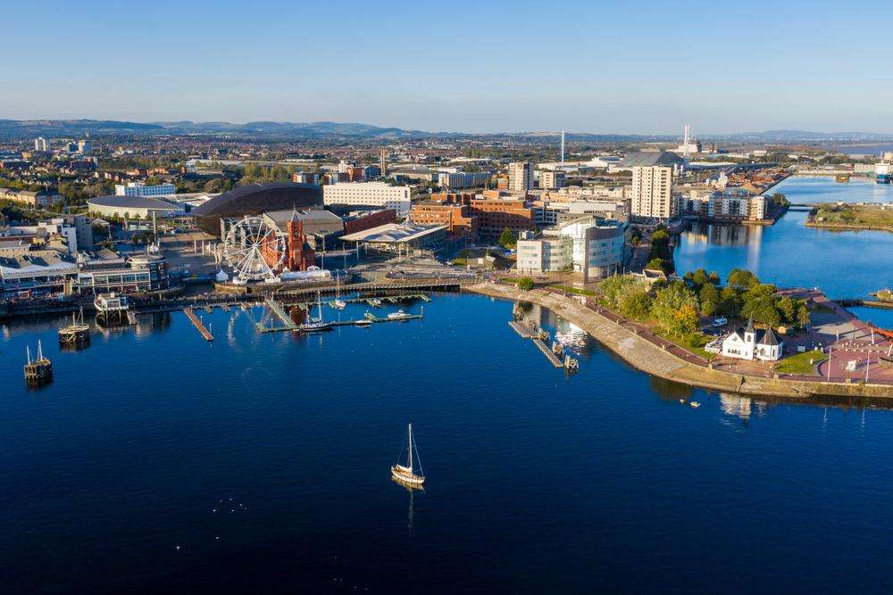 A drone image high above Cardiff showing an aerial view of Cardiff Bay, signifying the city where you can access addiction rehab in Cardiff.
